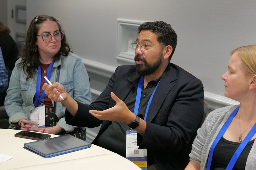 Global Impact 2026 attendees in roundtable session